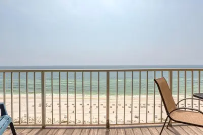 a balcony with a view of the beach at -BeachFront Premium-Summit 1124 in Panama City Beach