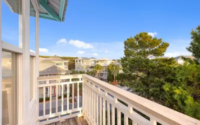 a view from the balcony of a house at The Loopy Crab by Oversee 30A in Seacrest