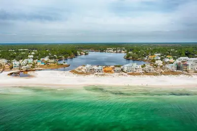 an aerial view of a beach with condos at Gone Coastal by Oversee 30A in Santa Rosa Beach