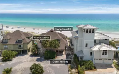 an aerial view of a house and the beach at Gone Coastal by Oversee 30A in Santa Rosa Beach