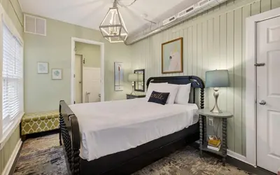 a bedroom with a large bed in a room at Casa Playa by Oversee 30A in Santa Rosa Beach