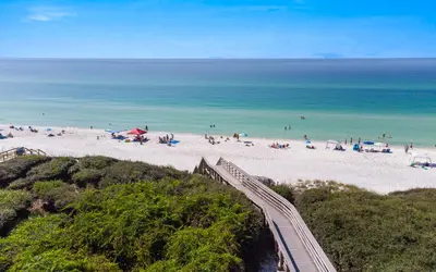 an aerial view of a beach with people on it at Casa Playa by Oversee 30A in Santa Rosa Beach