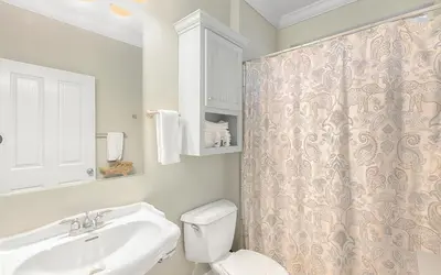 a bathroom with a sink and a toilet at Dare To Dream by Oversee 30A in Seacrest