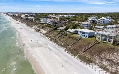 an aerial view of a beach and houses at Family Ties by Oversee 30A in Santa Rosa Beach