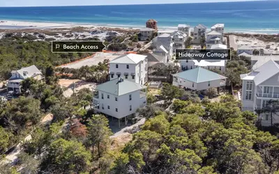 an aerial view of the beach access house and hollywood chapel at Hideaway Cottage by Oversee 30A in Inlet Beach