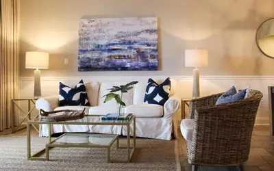 a living room with a couch and a table at High Pointe Unit 1-413 by Oversee 30A in Seacrest