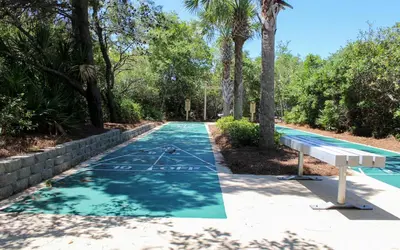 an empty swimming pool with a tennis court at High Pointe Unit 1-413 by Oversee 30A in Seacrest