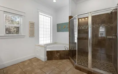 a bathroom with a walk in shower and a shower stall at Instant Gratification by Oversee 30A in Santa Rosa Beach