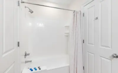 a bathroom with a shower and a sink at Legacy 201 Emerald Beach by Oversee 30A in Santa Rosa Beach