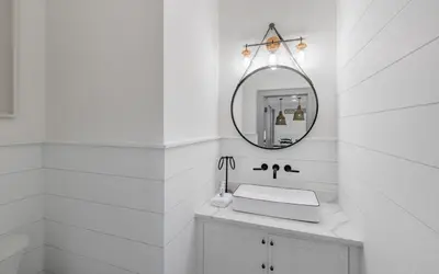 a white bathroom with a mirror and a sink at Peace of Mind by Oversee 30A in Santa Rosa Beach