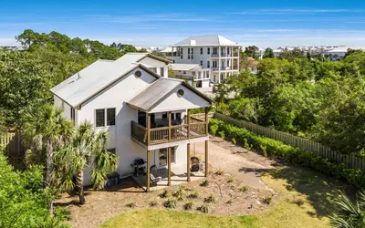an aerial view of a white house with a balcony at Santa Rosa Seaclusion by Oversee 30A in Santa Rosa Beach