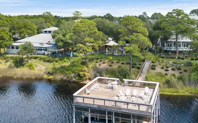 an aerial view of a dock on a lake at Santa Rosa Seaclusion by Oversee 30A in Santa Rosa Beach