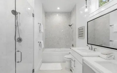 a white bathroom with two sinks and a shower at Slim Shady by Oversee 30A in Santa Rosa Beach