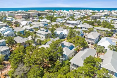 an aerial view of a city with houses and the ocean at Sound Waves Getaways by Oversee 30A in Rosemary Beach