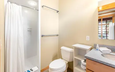 a bathroom with a toilet and a shower and a sink at Special Purpose by Oversee 30A in Santa Rosa Beach