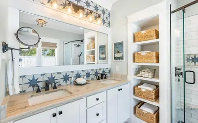 a bathroom with a sink and a mirror at Surfing Cowboy by Oversee 30A in Santa Rosa Beach