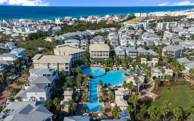 an aerial view of a resort with a pool and the ocean at The Fab Crab by Oversee 30A in Seacrest