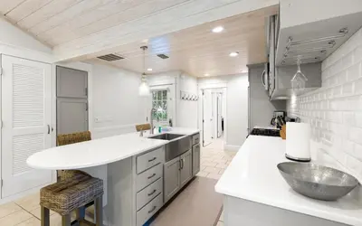 a kitchen with a sink and a counter at Villa Bon Secour by Oversee 30A in Seacrest