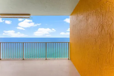 a balcony with a view of the ocean at Treasure Island #2302 in Panama City Beach