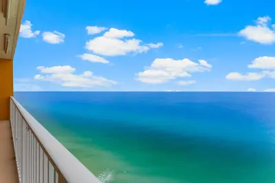 a view of the ocean from a balcony at Treasure Island #2302 in Panama City Beach