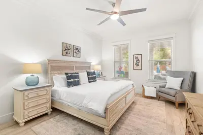 a bedroom with a bed and a ceiling fan at Steps to Beach, Large Private Pool, Bikes, Luxury in Santa Rosa Beach