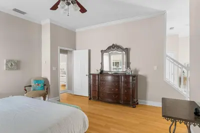 a bedroom with a dresser and a mirror at 30A Beach House - Seagrove Escape by Panhandle Getaways in Seagrove Beach