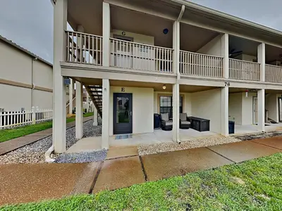 a large house with a balcony and a patio at Horizon South #76E in Panama City Beach