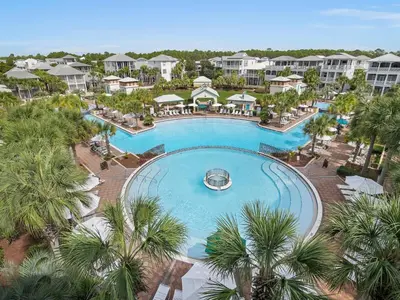 an overhead view of a pool at a resort at Villas at Seacrest #B401 - Bella Costa in Inlet Beach