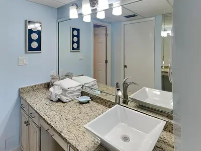 a bathroom with two sinks and a large mirror at Edgewater Villa #2008 Gulf Breeze Getaway in Panama City Beach