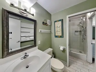 a bathroom with a sink and a toilet and a shower at Summit Beach Resort #1202 in Panama City Beach