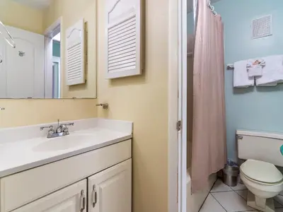 a bathroom with a sink and a toilet at Summit Beach Resort 1231 in Panama City Beach