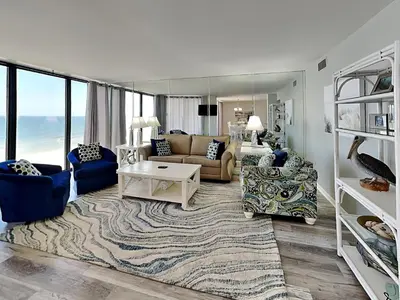 a living room with a couch and a table at Edgewater Tower II #606 in Panama City Beach