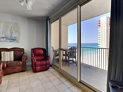 a living room with a view of the ocean at Shores of Panama #1423 in Panama City Beach