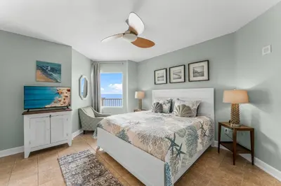 a bedroom with a bed and a window at Stunning 3BR Corner Tidewater Resort Beachfront Condo! Sleeps 10! by Dolce Vita Getaways PCB! in Panama City Beach