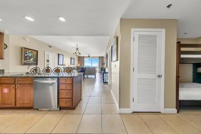 a kitchen with a sink and a counter top at Splash 507E in Panama City Beach