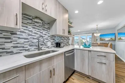 a kitchen with a sink and a counter top at Beachside Villas 832 in Santa Rosa Beach