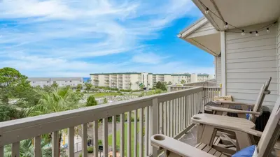 a balcony with chairs and a view of the beach at Ocean View Balcony Heated Pool Steps to the Beach The Sea Chord by AvantStay in Santa Rosa Beach
