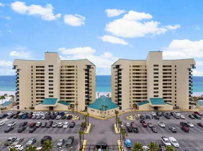 an aerial view of a parking lot at a resort at Sunbird Resort! Stunning Remodeled Beachfront Condo! Free Beach Chair Service! by Dolce Vita PCB! in Panama City Beach