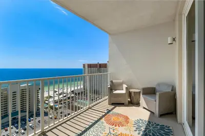 a balcony with a view of the ocean at Spectacular Ocean View Condo! Steps to the Beach! by Dolce Vita Getaways PCB! in Panama City Beach