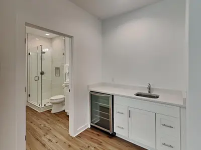 a white bathroom with a sink and a toilet at Sunset On Snapper A in Panama City Beach