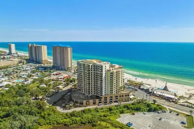 an aerial view of a beach with buildings and the ocean at Origin 1227 Beachy Dreams in Panama City Beach