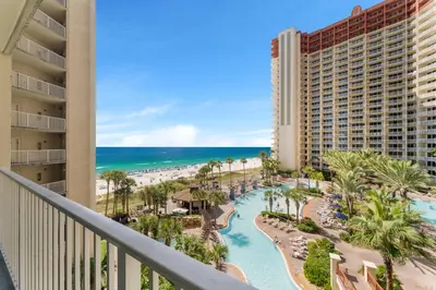 a view of the beach from the balcony of a resort at Shores Of Panama #0526 in Panama City Beach