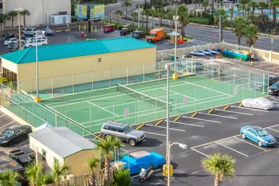 an aerial view of a tennis court in a parking lot at Sunbird Beach Resort #604 East in Panama City Beach
