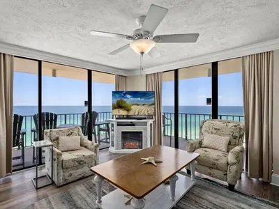 a living room with a view of the ocean at Edgewater Tower III #1212 in Panama City Beach