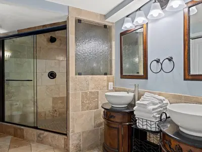 a bathroom with a sink and a shower at Edgewater Tower III #1212 in Panama City Beach