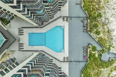 an overhead view of a swimming pool in a building at Ocean Front Beach Condo in Panama City Beach