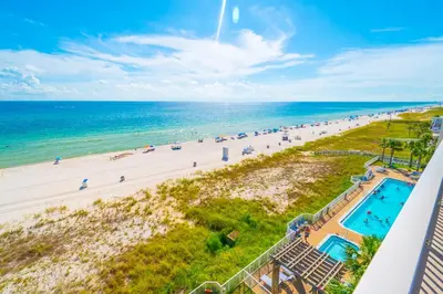 an overhead view of a beach with a swimming pool and the ocean at Sugar Shores OR in Panama City Beach