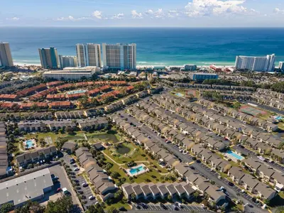 an aerial view of a city and the ocean at Gulf Highlands #222 in Panama City Beach