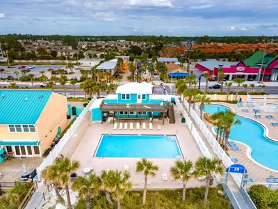 an aerial view of a pool at a resort at Gulf Highlands #222 in Panama City Beach