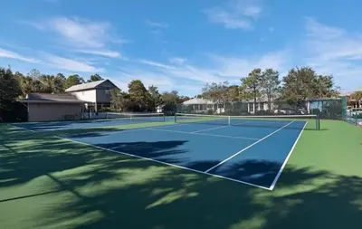 a tennis court with a tennis court at 30A | Pool | Sunnyside Up | Walk to Beach| Golf Cart | Seagrove in Santa Rosa Beach